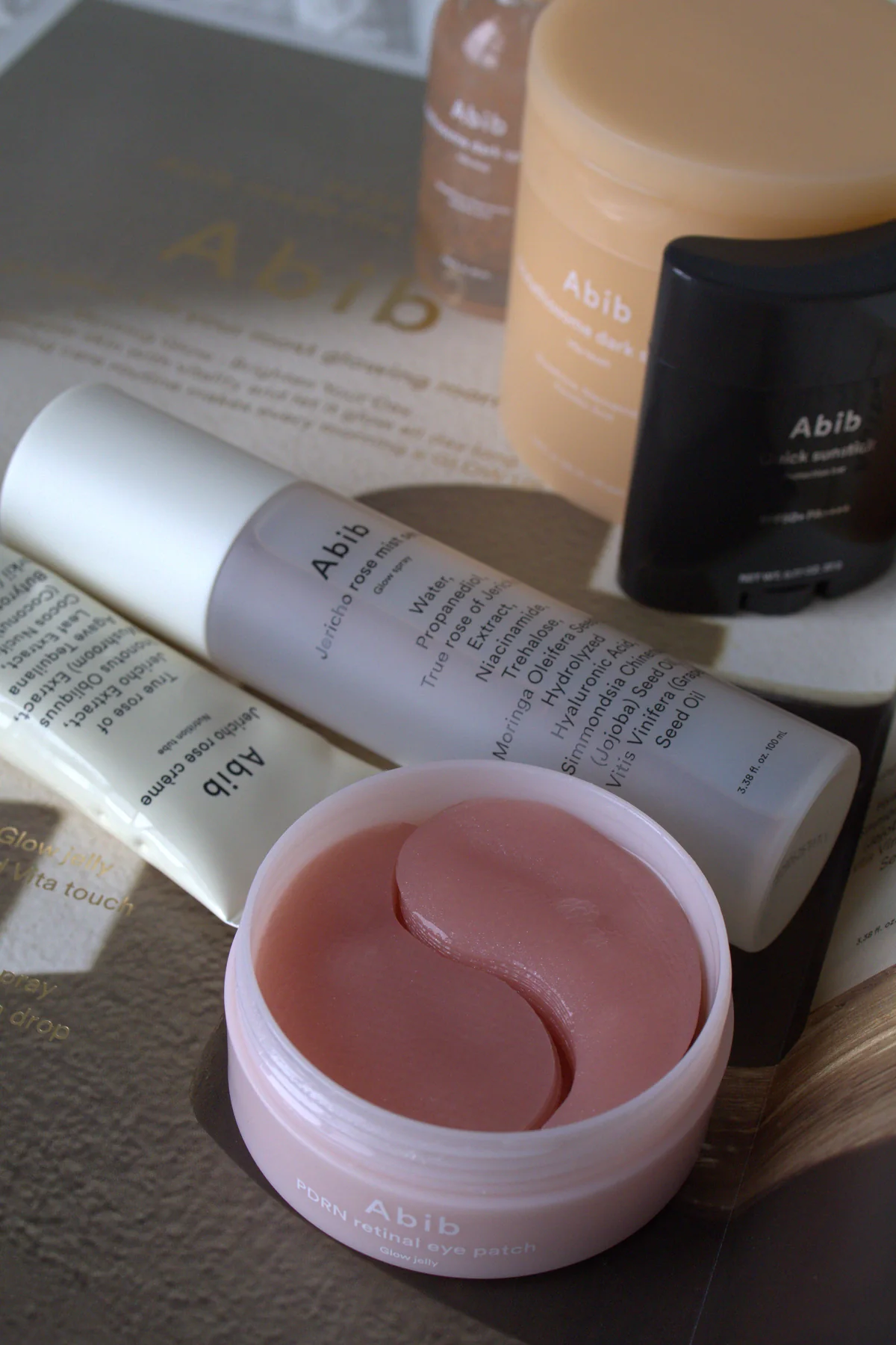 Abib skincare products arranged in warm natural light